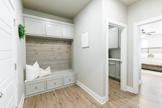 mudroom featuring light hardwood / wood-style floors and ceiling fan