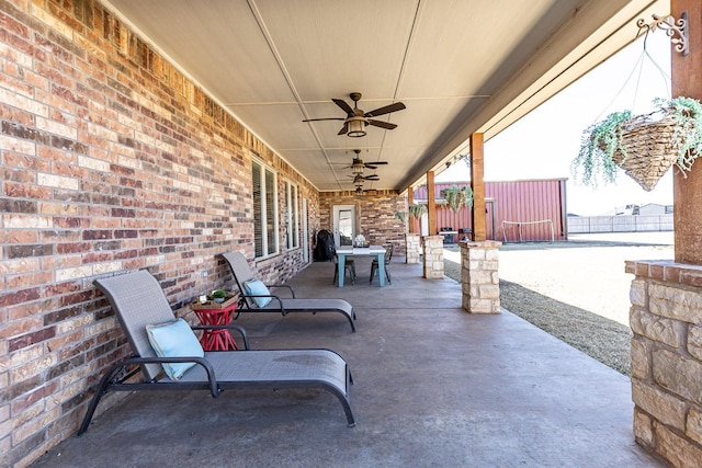 view of patio / terrace featuring ceiling fan