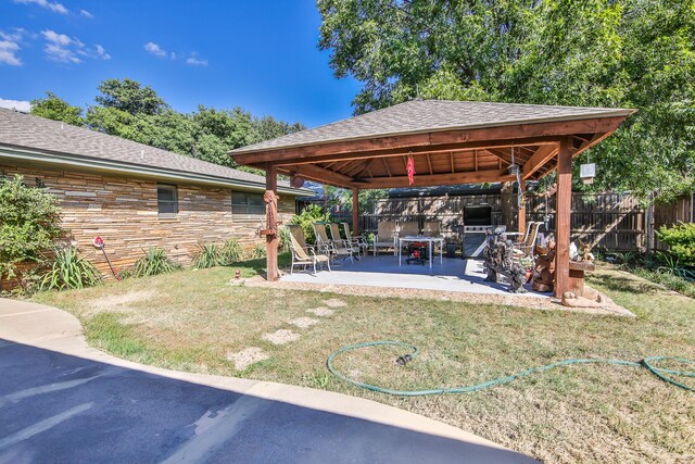 view of yard with a gazebo and a patio