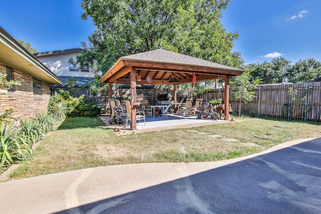 view of yard with a gazebo and a patio area