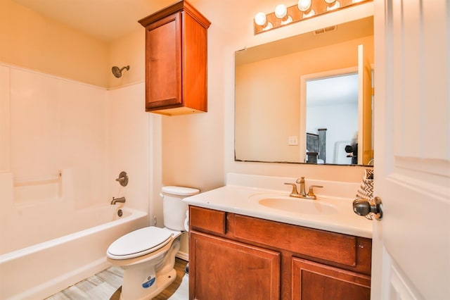 bathroom with visible vents, toilet, shower / bath combination, and vanity