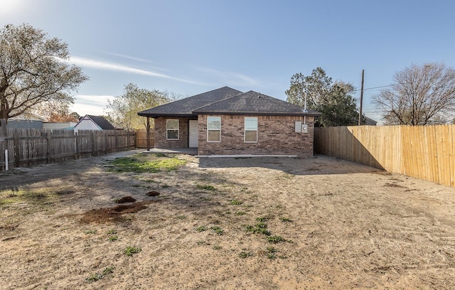 back of house with a patio area