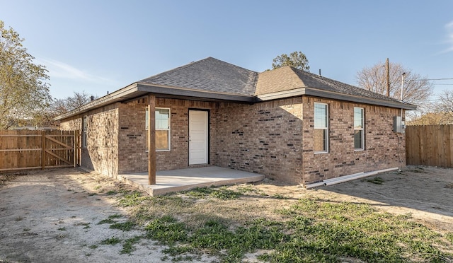 back of house featuring a patio