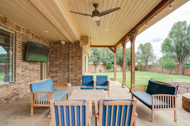 view of patio featuring an outdoor hangout area and ceiling fan