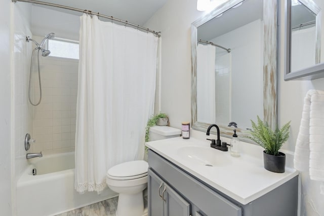 full bathroom with vanity, wood-type flooring, toilet, and shower / tub combo with curtain