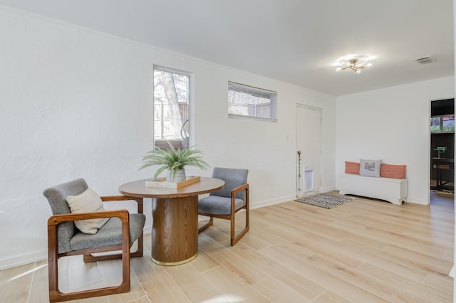 dining space featuring light hardwood / wood-style flooring