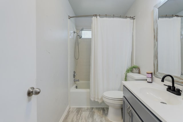 full bathroom with wood-type flooring, toilet, vanity, and shower / bath combo with shower curtain