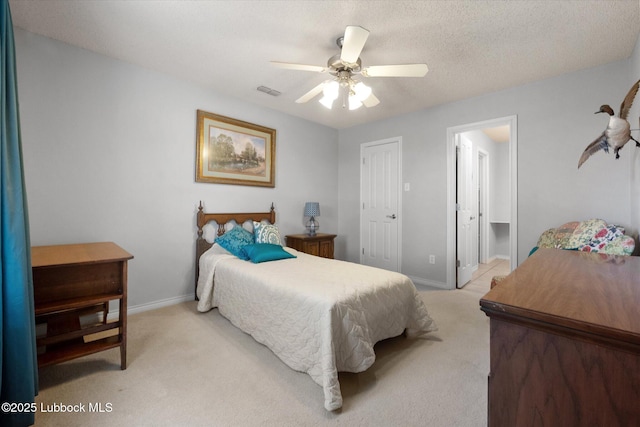 10401 Elgin Ave, Lubbock, TX 79423 - bedroom featuring light colored carpet and a ceiling fan
