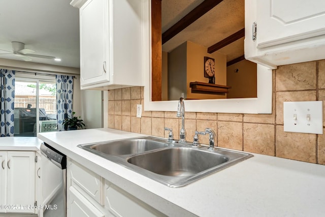 5734 92nd St, Lubbock, TX 79424 - kitchen with decorative backsplash, dishwasher, a sink, light countertops, and white cabinets