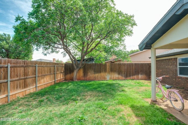 5734 92nd St, Lubbock, TX 79424 - view of yard with a fenced backyard
