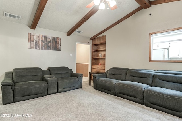 5734 92nd St, Lubbock, TX 79424 - living room featuring carpet, ceiling fan, lofted ceiling with beams, and visible vents