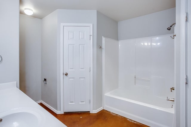 bathroom featuring vanity and shower / tub combination