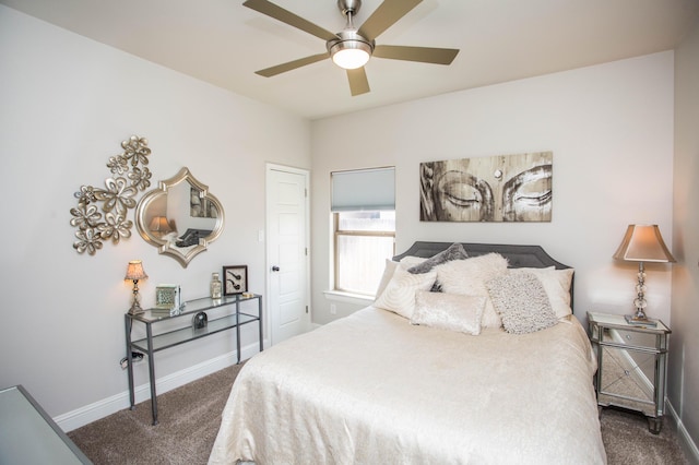carpeted bedroom with baseboards and ceiling fan
