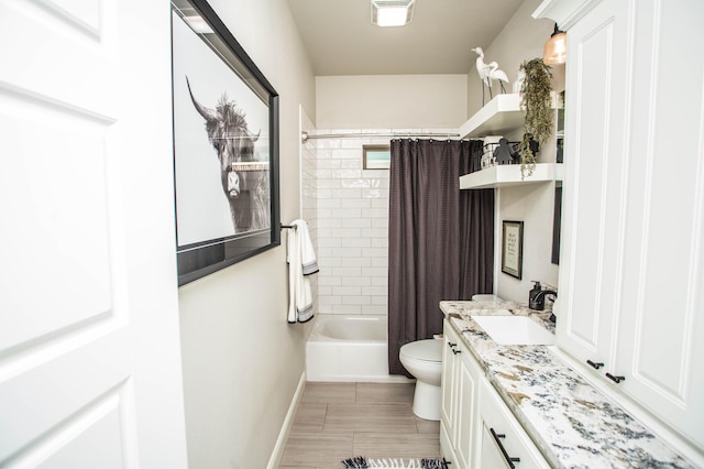 full bathroom featuring toilet, vanity, baseboards, visible vents, and shower / tub combo with curtain