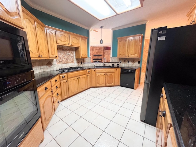 kitchen featuring light tile patterned flooring, sink, crown molding, decorative backsplash, and black appliances