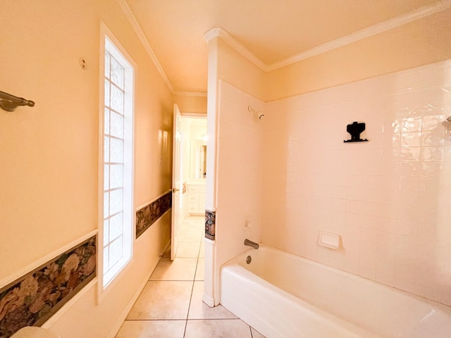 bathroom with crown molding, tiled shower / bath, tile patterned flooring, and a wealth of natural light