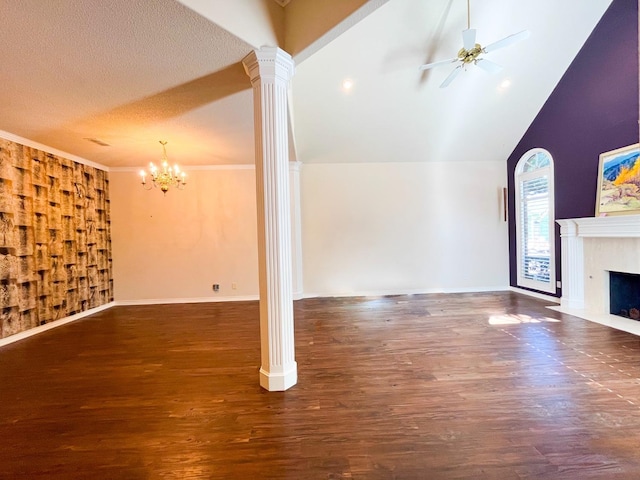 unfurnished living room with crown molding, decorative columns, dark hardwood / wood-style floors, a high end fireplace, and ceiling fan with notable chandelier