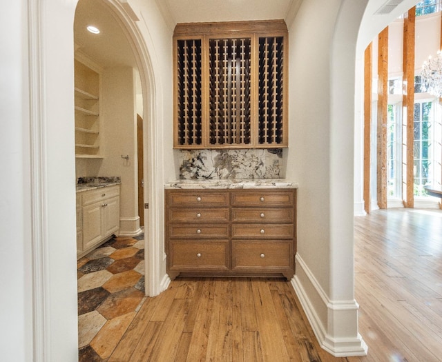 wine area featuring light wood-type flooring