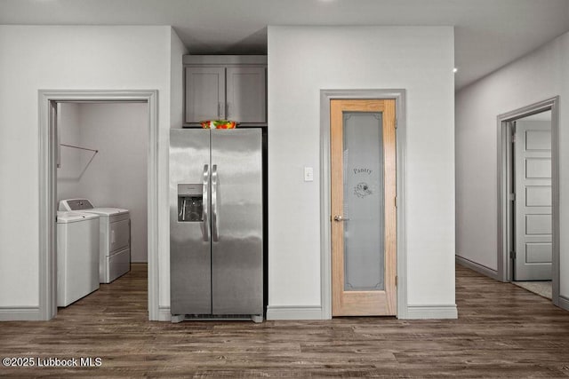 902 N Fulton Ave, Lubbock, TX 79416 - kitchen with stainless steel fridge with ice dispenser, washing machine and dryer, gray cabinetry, and dark wood-style flooring