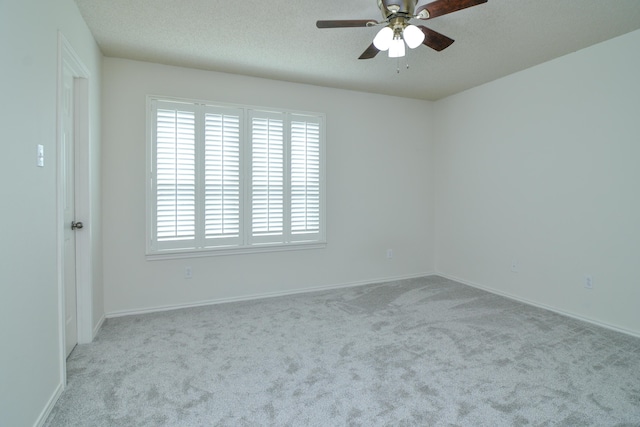 9808 Huron Ave, Lubbock, TX 79424 - unfurnished room featuring carpet floors and a ceiling fan