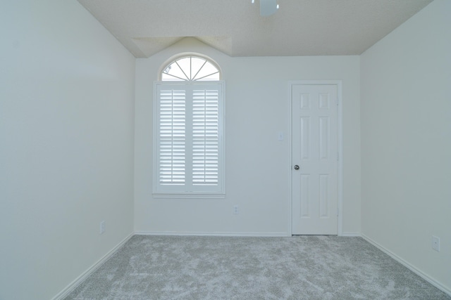 9808 Huron Ave, Lubbock, TX 79424 - carpeted empty room with lofted ceiling and baseboards