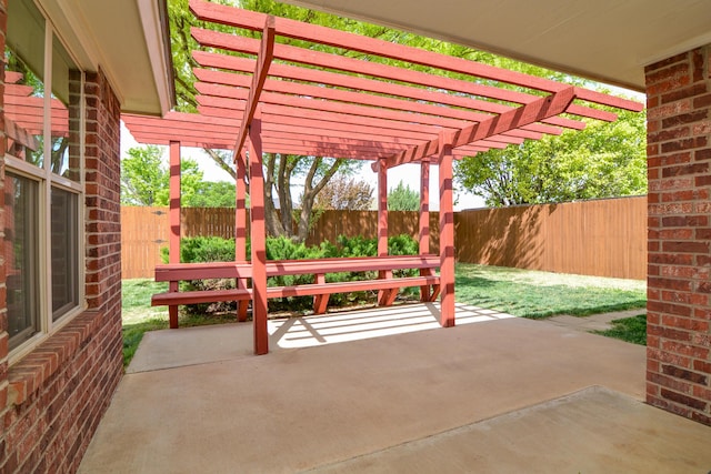 9808 Huron Ave, Lubbock, TX 79424 - fenced backyard with a pergola and a patio
