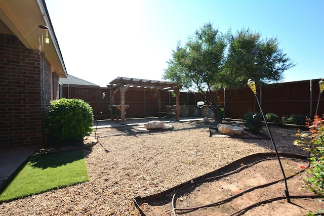 view of yard featuring a pergola and a patio area