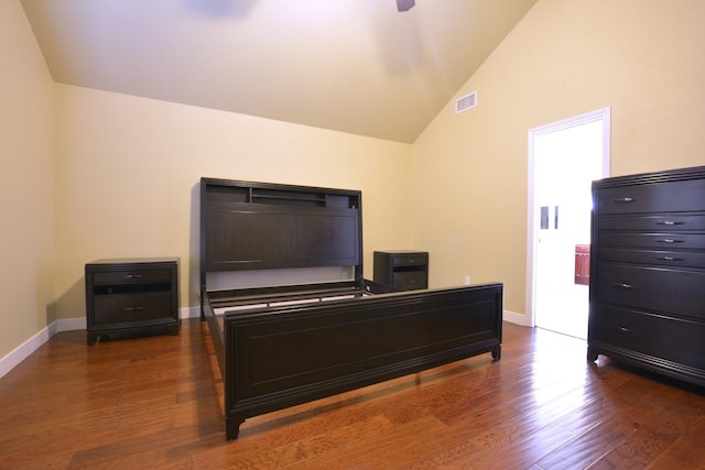 office space featuring lofted ceiling and dark hardwood / wood-style floors