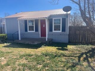 6423 22nd St, Lubbock, TX 79407 - view of front of house featuring a metal roof