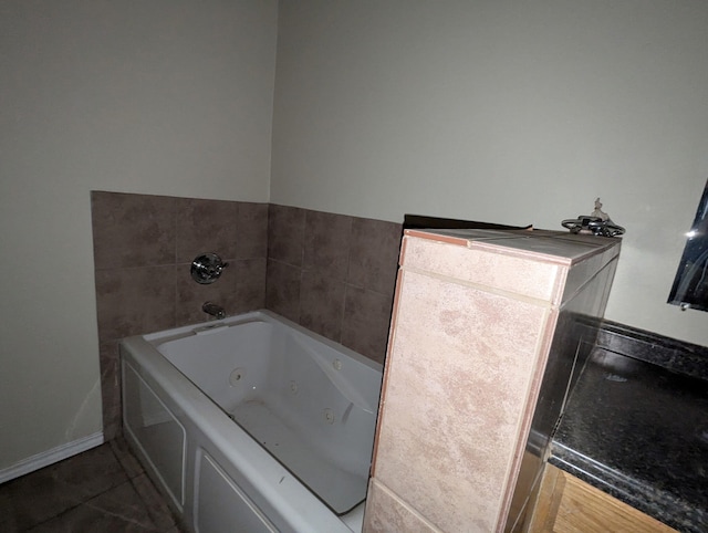 6423 22nd St, Lubbock, TX 79407 - full bathroom featuring a tub with jets and tile patterned floors