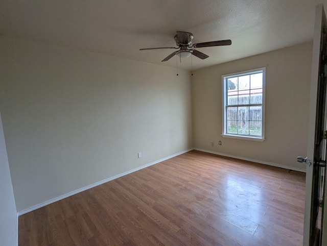 6423 22nd St, Lubbock, TX 79407 - unfurnished room featuring wood finished floors and ceiling fan