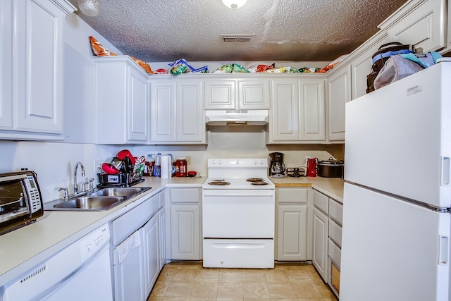 kitchen featuring white cabinetry, sink, white appliances, and a textured ceiling