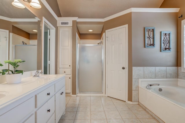 bathroom with tile patterned flooring, vanity, ornamental molding, and plus walk in shower