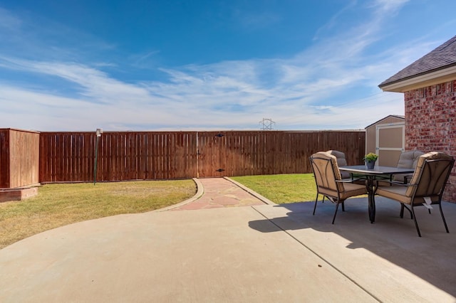 view of patio / terrace featuring a shed