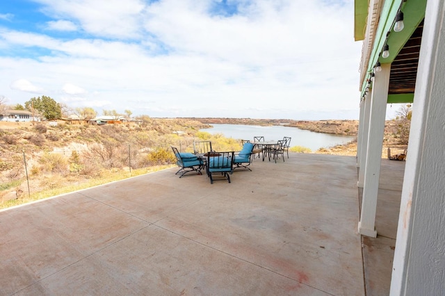 view of patio / terrace featuring a water view