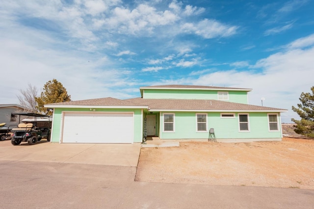 single story home with a garage