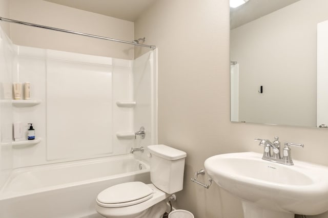 full bathroom with shower / bath combination, sink, and toilet