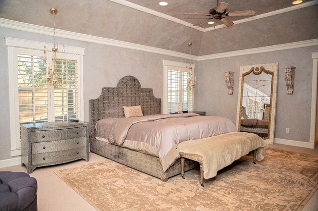 carpeted bedroom featuring ornamental molding, lofted ceiling, and ceiling fan