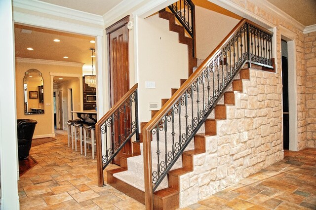 stairs with crown molding