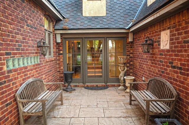 doorway to property featuring french doors and a patio