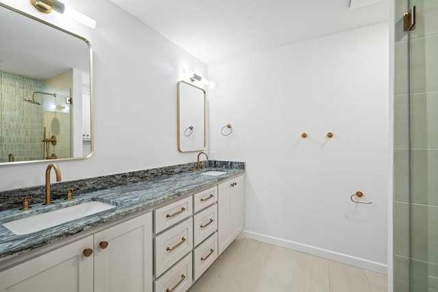 bathroom featuring vanity and a tile shower