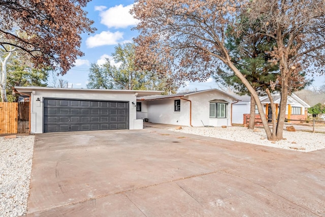 single story home with a garage