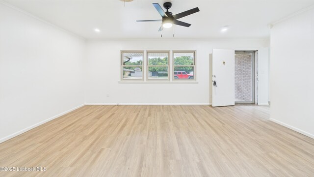 3811 42nd St, Lubbock, TX 79413 - spare room featuring light wood finished floors, ceiling fan, and crown molding