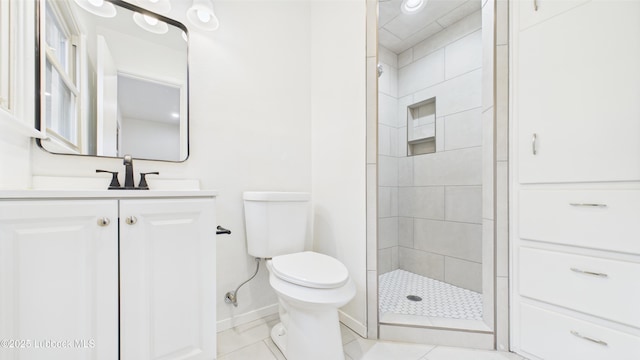 3811 42nd St, Lubbock, TX 79413 - bathroom featuring vanity, a shower stall, and tile patterned floors