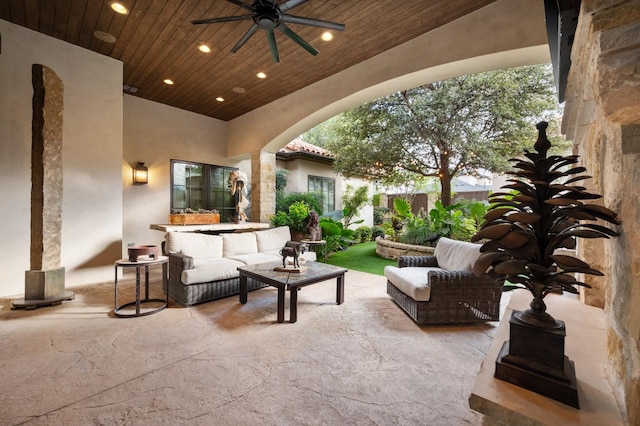 view of patio featuring ceiling fan and an outdoor living space