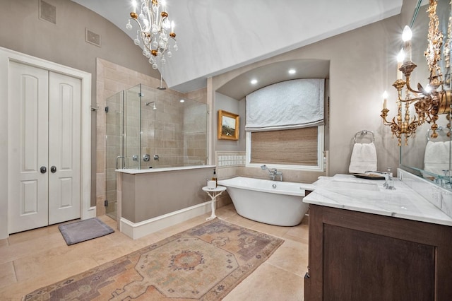 bathroom with lofted ceiling, separate shower and tub, a notable chandelier, and vanity