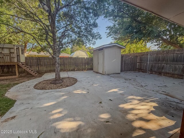 5309 77th St, Lubbock, TX 79424 - fenced backyard with a patio area