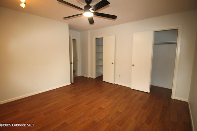 3707 38th St, Lubbock, TX 79413 - unfurnished bedroom with multiple closets and wood finished floors