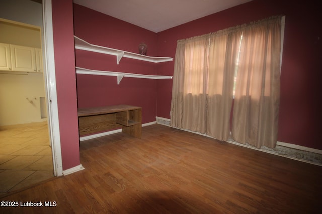 3707 38th St, Lubbock, TX 79413 - unfurnished bedroom featuring wood finished floors and baseboards