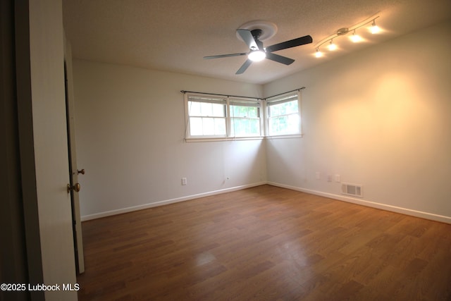 3707 38th St, Lubbock, TX 79413 - unfurnished room featuring a ceiling fan and wood finished floors